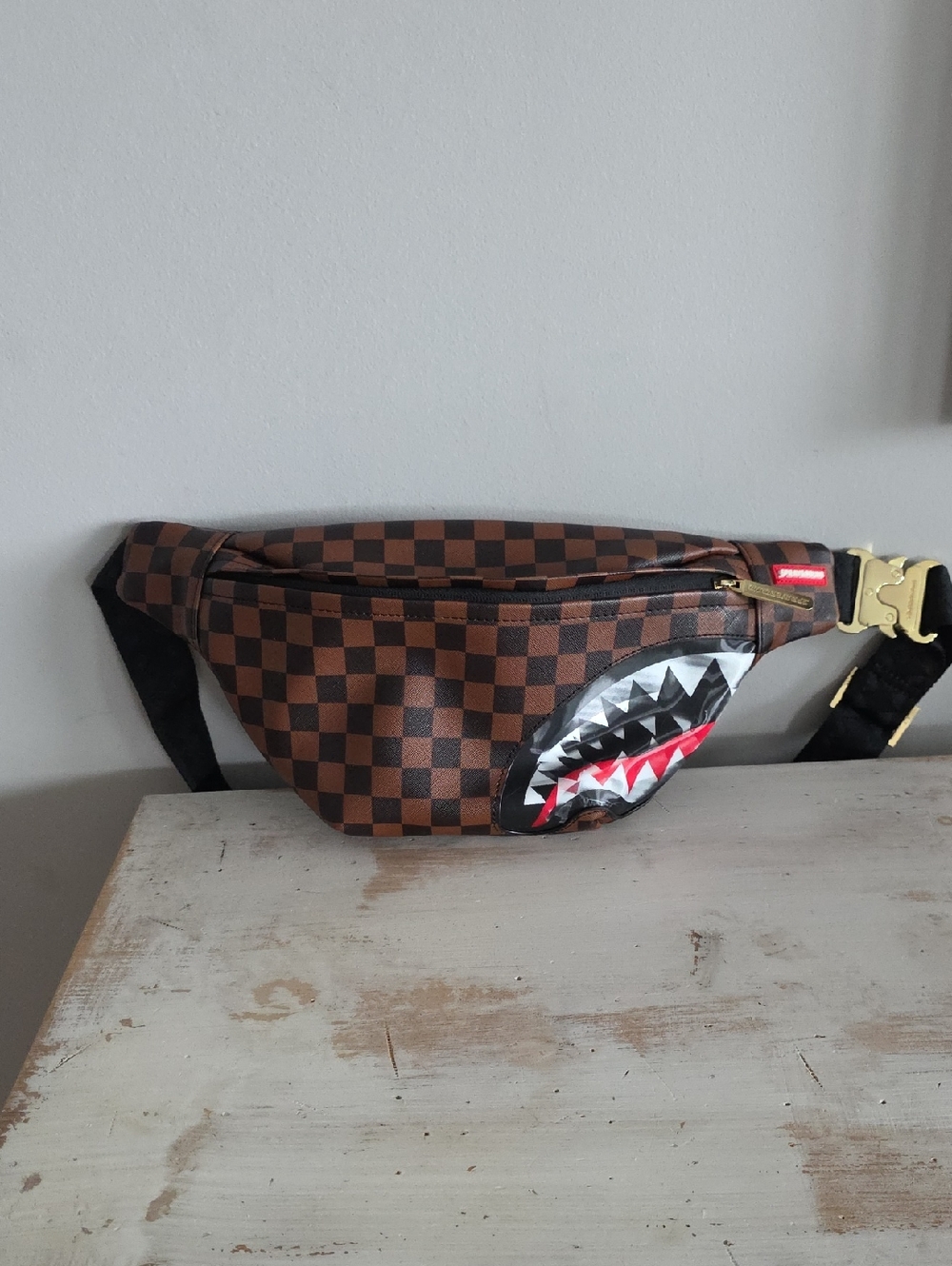 Sprayground Limited Edition Sharks in Paris Checkerboard Crossbody Bag in brown